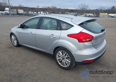 2017 Ford Focus Titanium z USA, uszkodzony, nr VIN 1FADP3N28HL333927